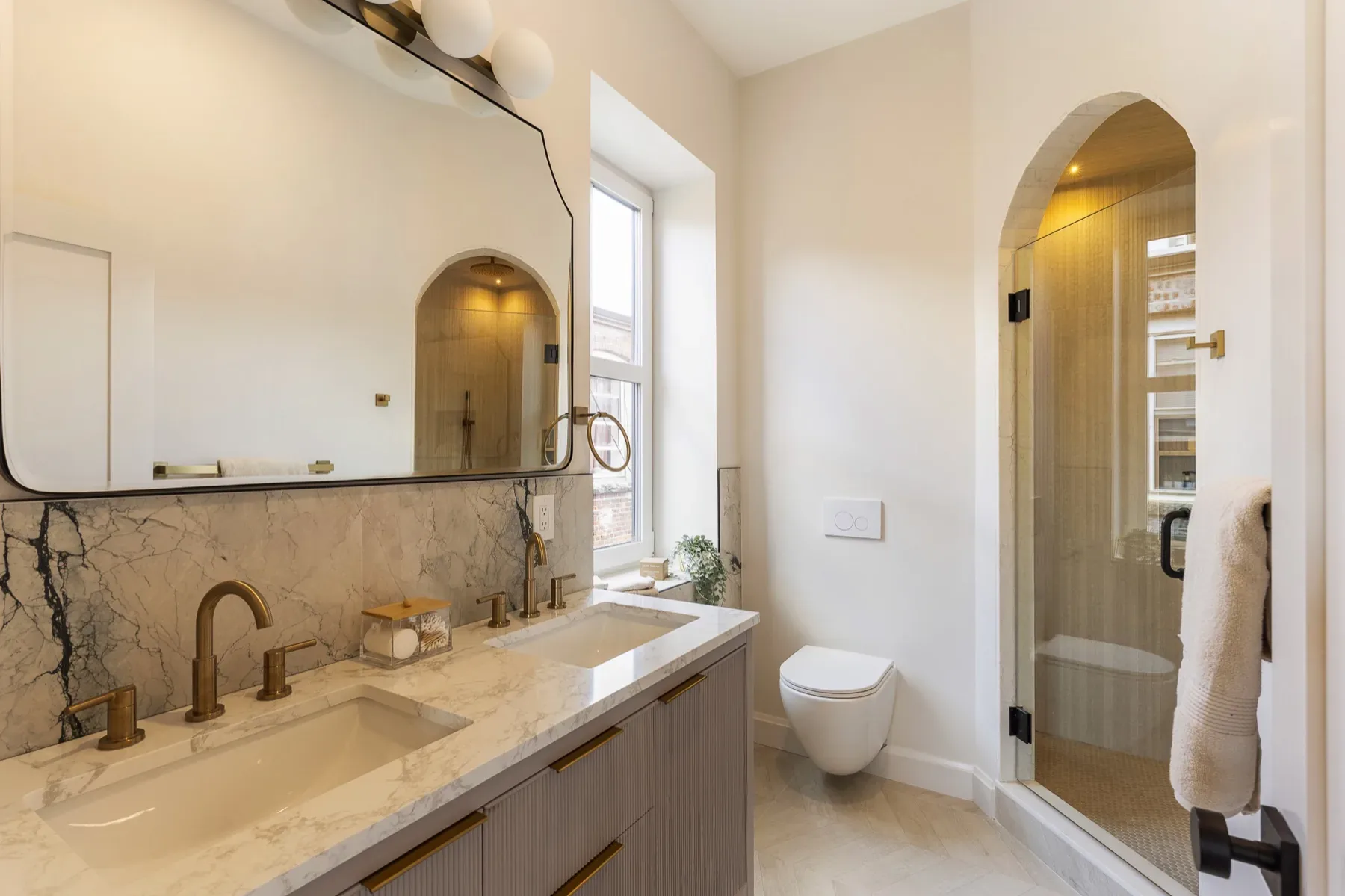 Spa-like primary bathroom in Unit 5 at 75 Lubec Street